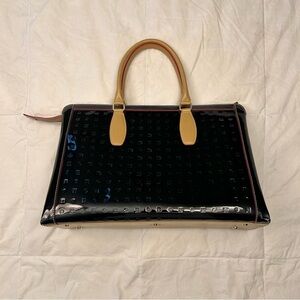 Black mid-sized Arcadia handbag.